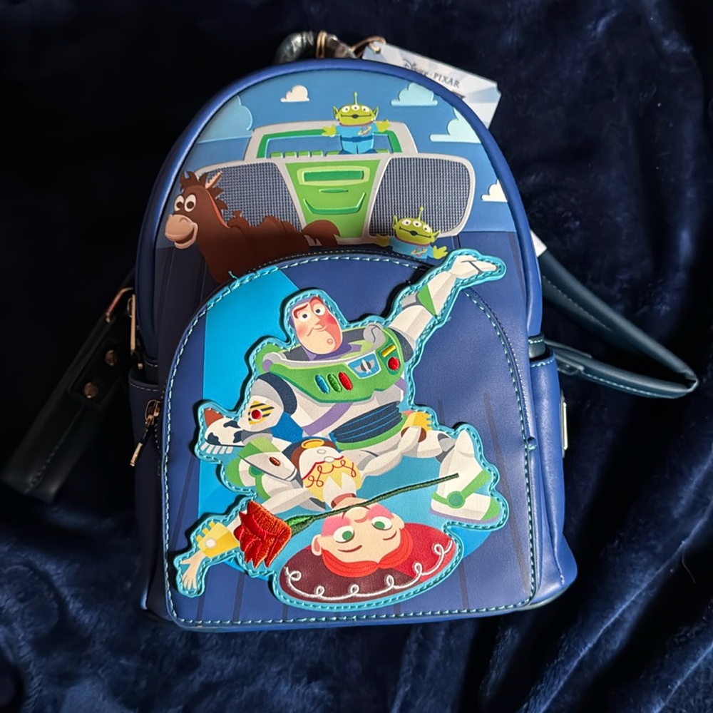 NWT LF Pixar Moments Toy Story Jessie and Buzz Mini Backpack